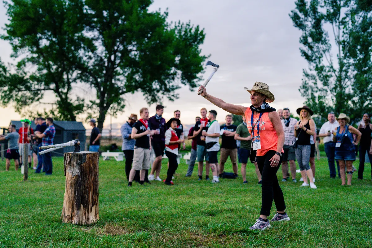 Guests gathered outdoors for activities at a SmallSat reception