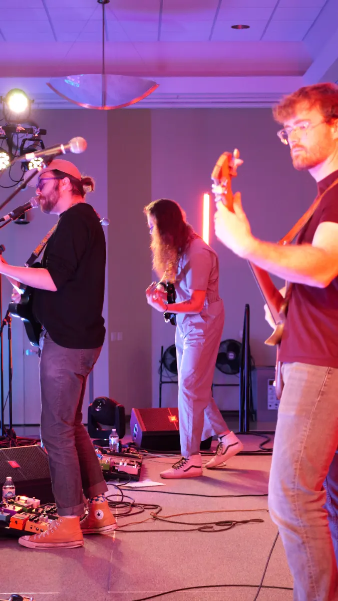 Band performing to the ballroom during the daytime session