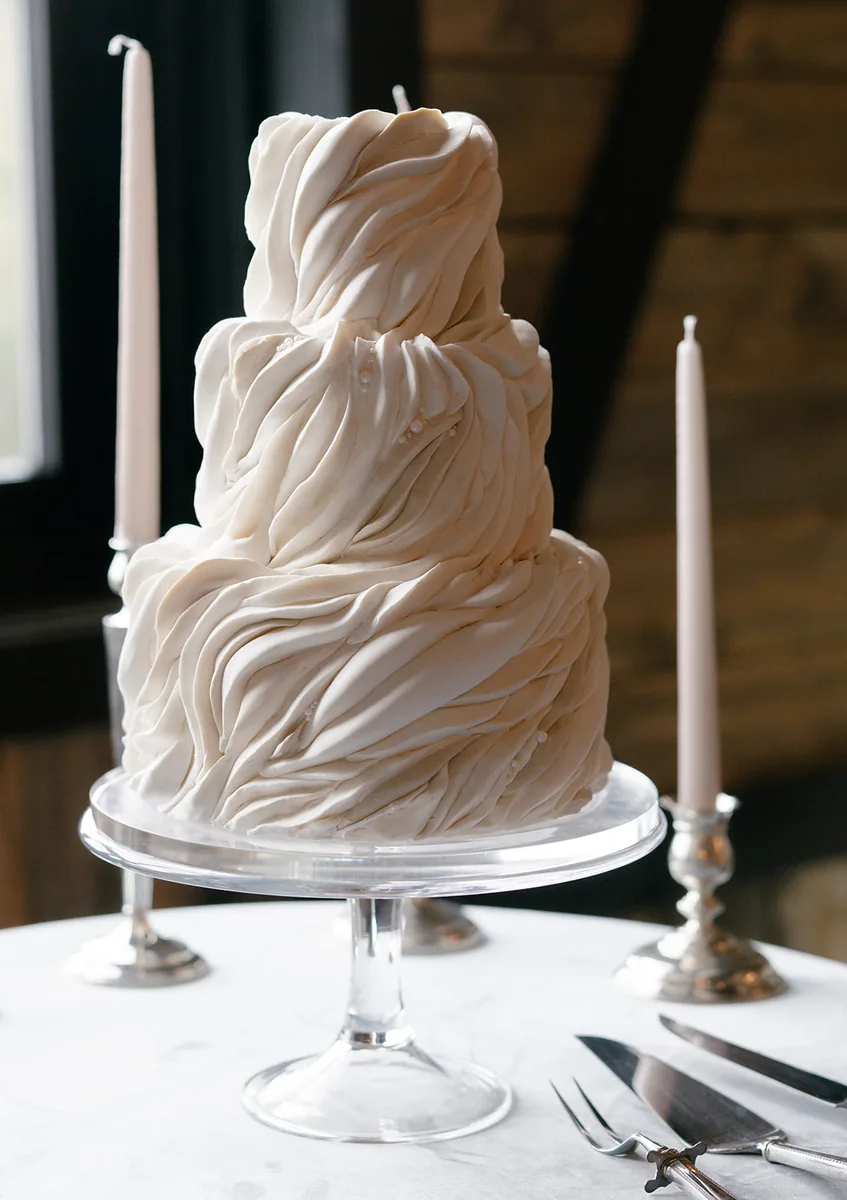 Custom cake by Lustr Creative styled on a dinner table