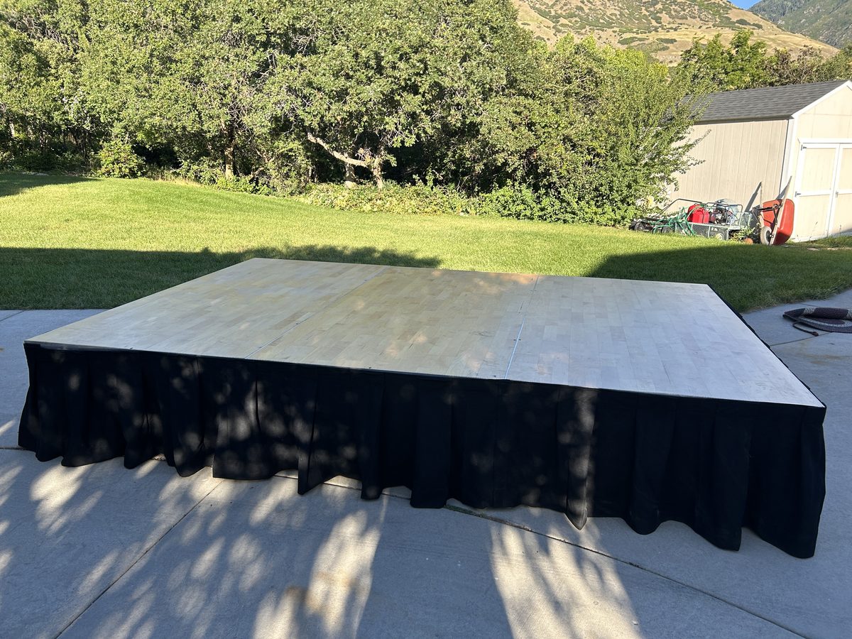 8 by 12 foot maple top stage set up outdoors
